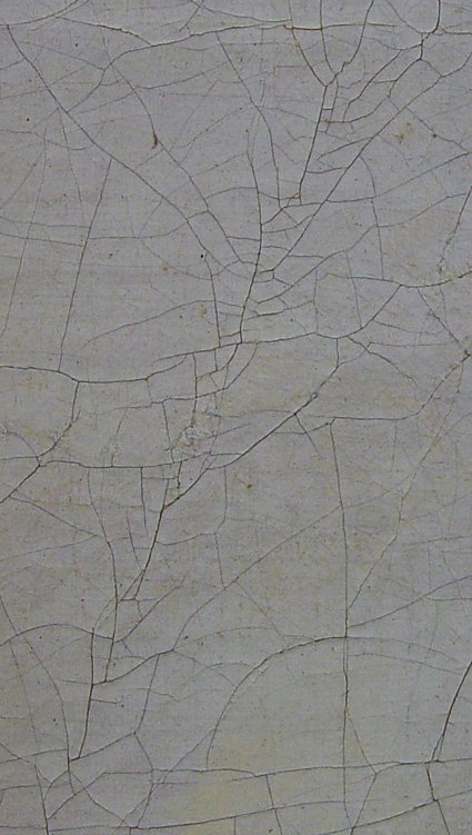Feather cracks (also called herring bone cracks) are generated as a consequence of an accidental scraping of the painting in the back.