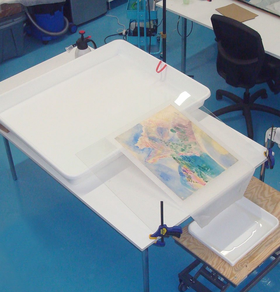 At the end of the washing process. Discoloration products are not dissolved by the water anymore.