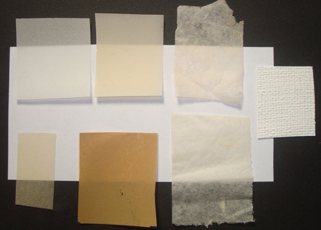 Samples of hand made papers with Solkafloc (the four to the left), with whatman fibers (to the right, and a sample of a texturized filling material with the addition of paper as a filler.