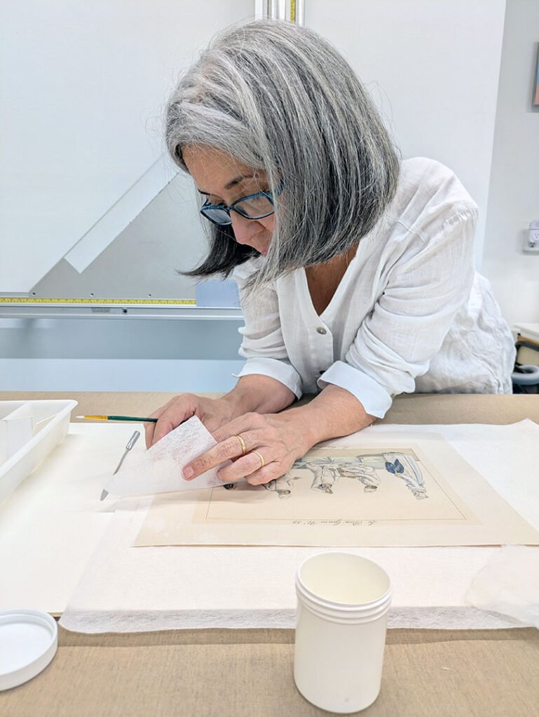 Paper conservator at workat the paper conservation lab